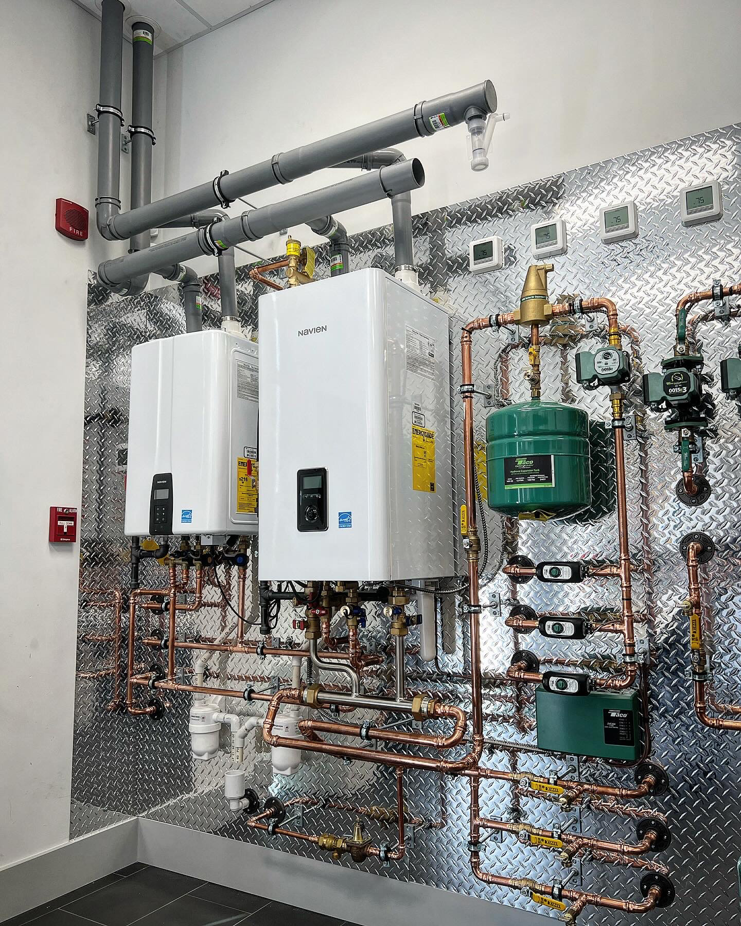 Custom hydronic boiler, circulator pumps, and radiant system installation
